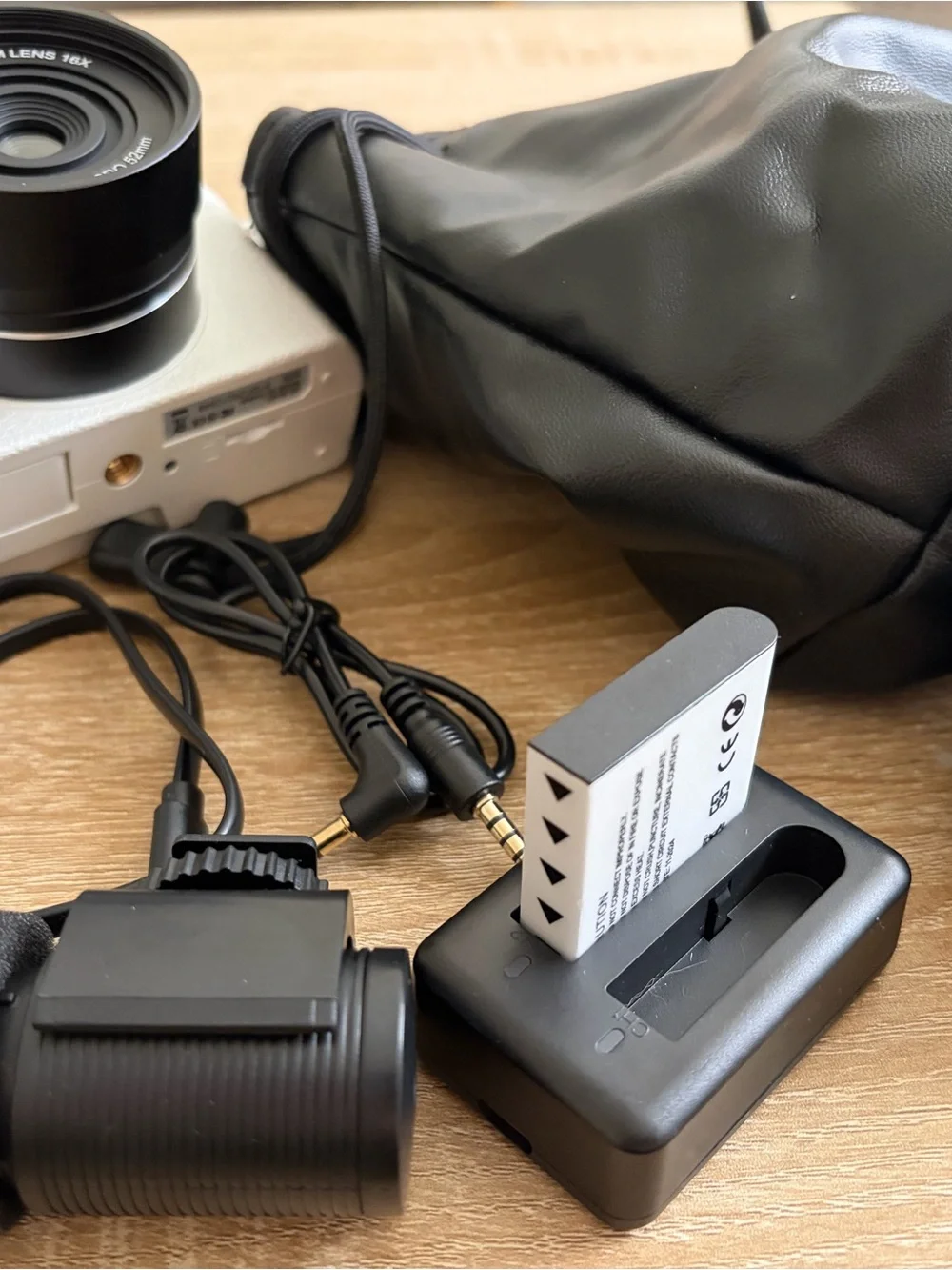 Compact White and Black Digital Camera with Zoom Lens